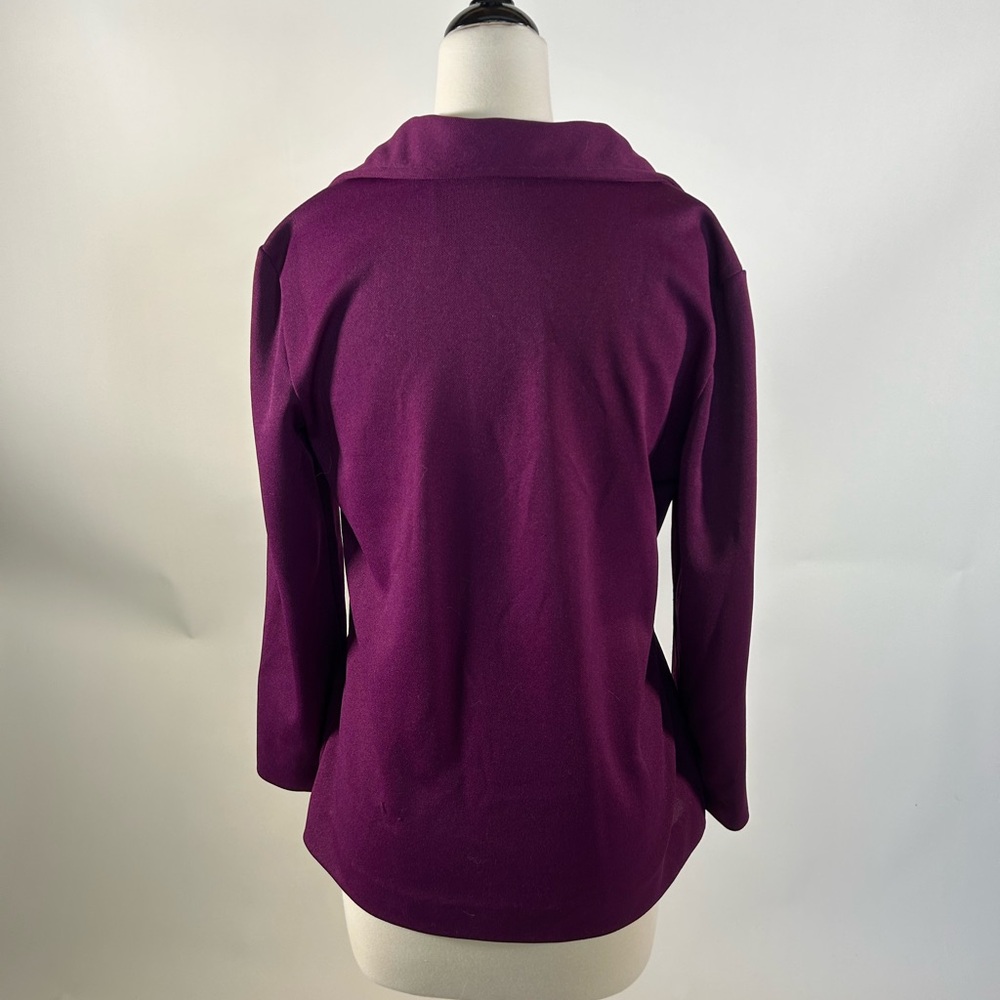 1970s purple leisure suit with dagger collar